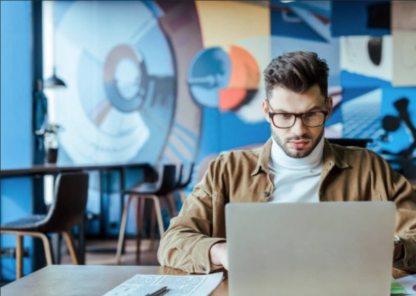 man working on laptop