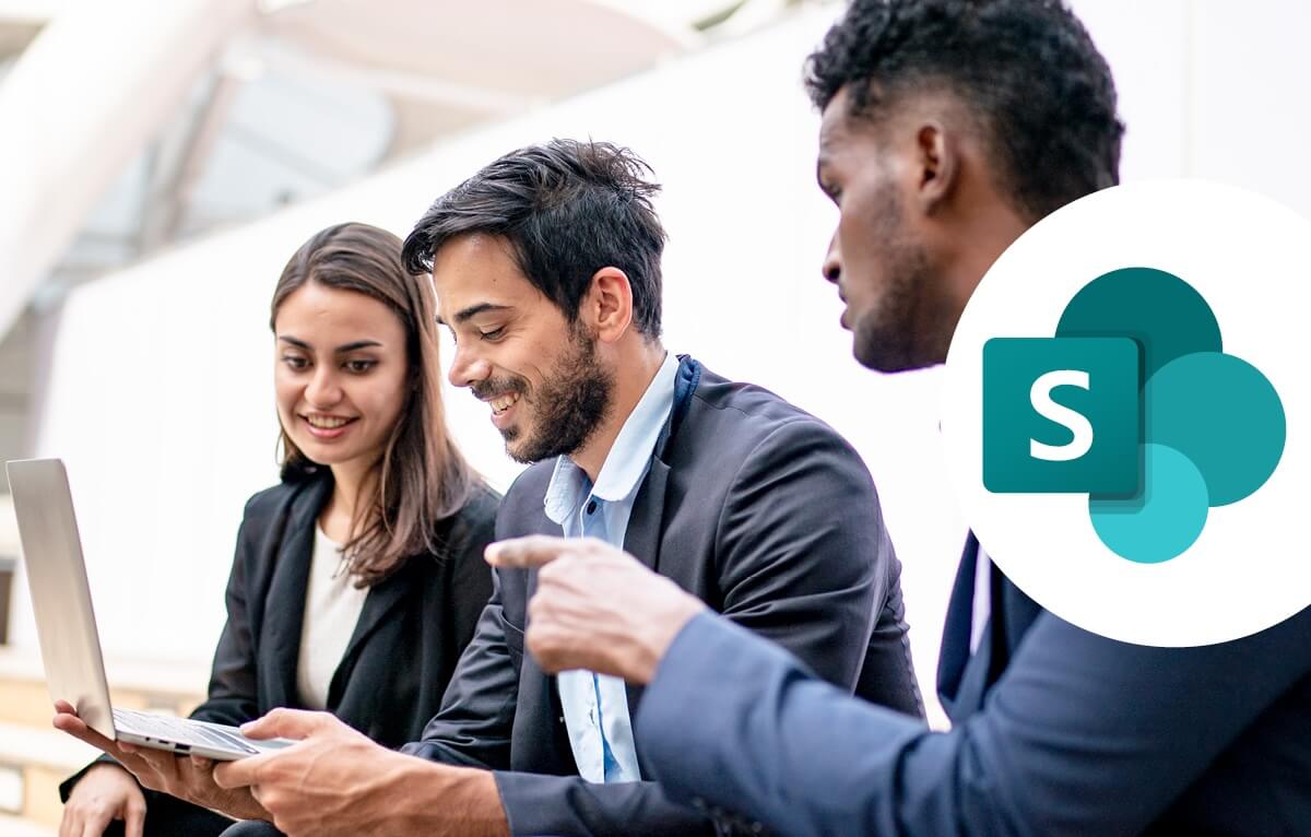 coworkers collaborating on laptop